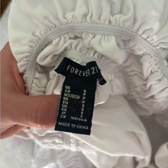 White Ruffled Off-Shoulder Top
Forever 21
Small - Picture 4 of 4